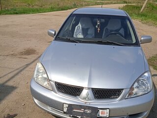 2007 Mitsubishi Lancer IX Рестайлинг, серебристый, 850000 рублей, вид 1