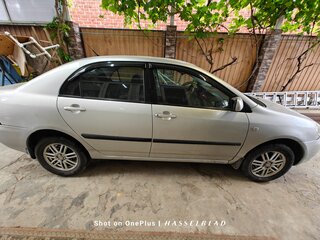 2003 Toyota Corolla IX (E120, E130), серебристый, 500000 рублей, вид 4