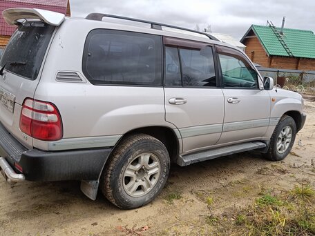 2004 Toyota Land Cruiser 100 Series Рестайлинг 1, серебристый, 1790000 рублей, вид 4