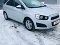 2012 Chevrolet Aveo II, серебристый, 680000 рублей