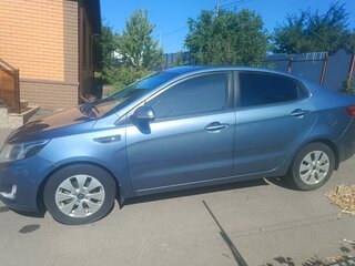 2013 Kia Rio 4-speed III, голубой, 860000 рублей, вид 3