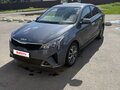 2021 Kia Rio IV Рестайлинг, серый, 1900000 рублей - вид 1