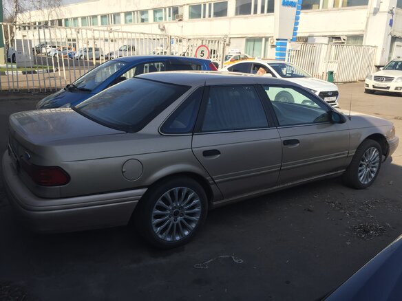 1993 Ford Taurus II, золотистый - вид 3