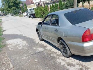 1996 Mitsubishi Diamante II, серый, 645000 рублей, вид 3