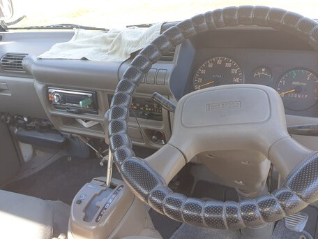 1994 Isuzu Elf (N-series), белый, 400000 рублей, вид 4