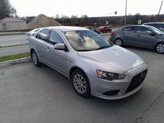 2012 Mitsubishi Lancer X Рестайлинг, серебристый, 830000 рублей, вид 2
