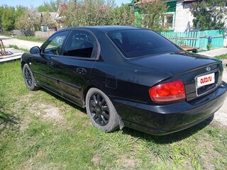 2005 Hyundai Sonata ТагАЗ IV (EF) Рестайлинг, чёрный, 400000 рублей, вид 4