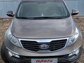 2011 Kia Sportage III, коричневый, 830000 рублей - вид 1