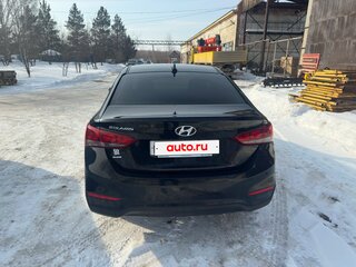 2019 Hyundai Solaris II, чёрный, 1550000 рублей, вид 4