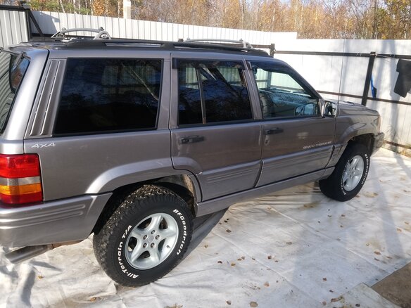 1998 Jeep Grand Cherokee I (ZJ) Рестайлинг, серебристый - вид 4