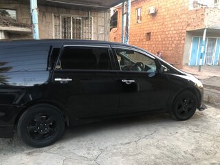 2003 Mitsubishi Grandis I, чёрный, 720000 рублей, вид 4