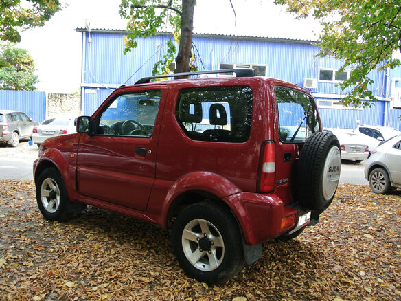 2011 Suzuki Jimny III Рестайлинг 1, красный - вид 10