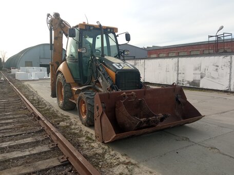 2006 Caterpillar 428, жёлтый, 3700000 рублей, вид 2