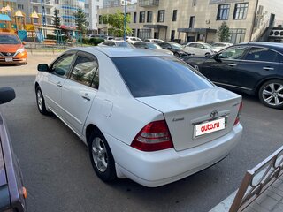 2004 Toyota Corolla IX (E120, E130) Рестайлинг, белый, 600000 рублей, вид 3