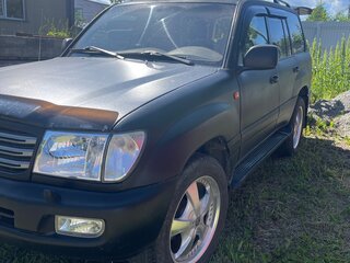 2002 Toyota Land Cruiser 100 Series Рестайлинг 1, чёрный, 1900000 рублей, вид 2