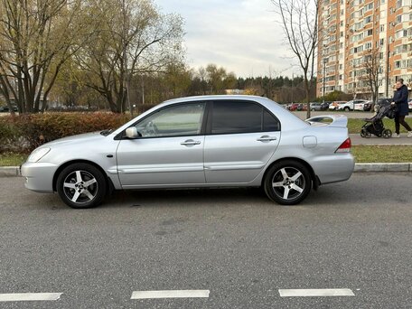 2009 Mitsubishi Lancer Classic IX Рестайлинг, серебристый, 650000 рублей, вид 2