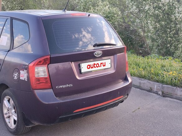 2010 Kia Carens II (UN), фиолетовый, 550000 рублей - вид 10