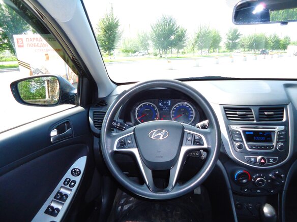 2016 Hyundai Solaris I Рестайлинг, коричневый, 945000 рублей - вид 10