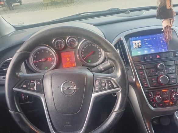 2012 Opel Astra J Рестайлинг, чёрный, 900000 рублей - вид 6