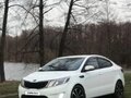 2011 Kia Rio 5-speed III, белый, 750000 рублей