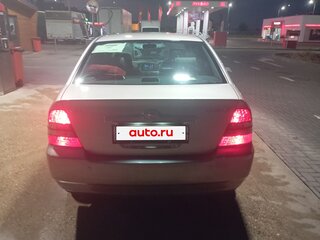 2003 Toyota Corolla IX (E120, E130), золотистый, 500000 рублей, вид 5