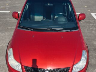 2010 Suzuki SX4 I (Classic) Рестайлинг, оранжевый, 620000 рублей, вид 3