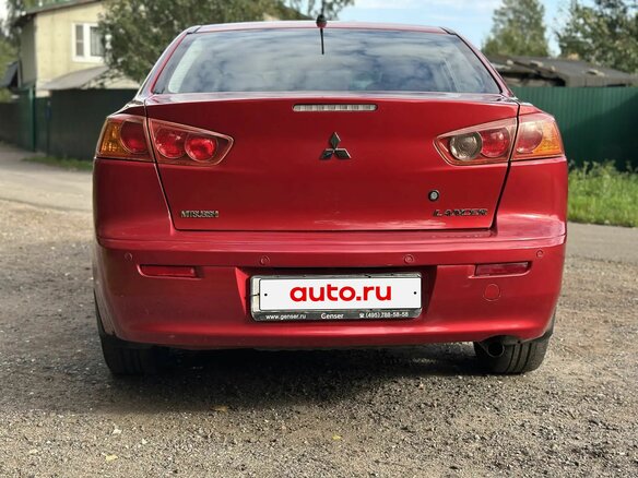 2008 Mitsubishi Lancer X, красный - вид 7