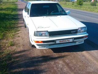 1986 Nissan Bluebird VIII (T12, T72), белый, 200000 рублей, вид 1