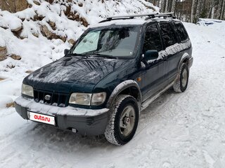 2004 Kia Sportage Grand I, зелёный, 525000 рублей, вид 3