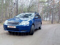 2004 Toyota Corolla IX (E120, E130), синий