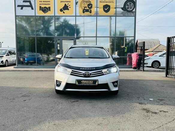 2014 Toyota Corolla XI (E160, E170, E180), серебристый - вид 3