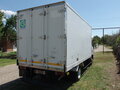 2005 Isuzu Elf (N-series), белый - вид 2