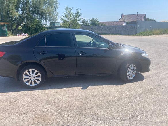 2008 Toyota Corolla X (E140, E150), чёрный - вид 5