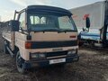 1990 Mazda Titan, бежевый, 900000 рублей - вид 1