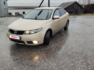 2009 Kia Cerato 4-speed II, золотистый, 680000 рублей, вид 1