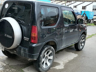 2010 Suzuki Jimny Kei car III Рестайлинг 1, чёрный, 890000 рублей, вид 2