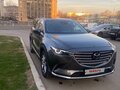 2022 Mazda CX-9 II Рестайлинг, серый, 4500000 рублей - вид 1
