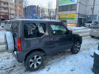 2011 Suzuki Jimny Kei car III Рестайлинг 1, чёрный, 1200000 рублей, вид 3