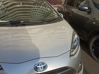 2018 Toyota Aqua I Рестайлинг 2, серый, 1900000 рублей, вид 1