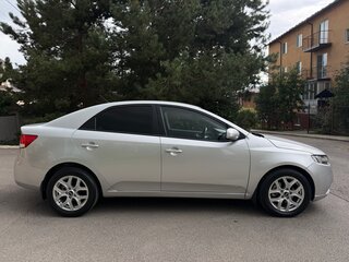 2010 Kia Cerato 6-speed II, серебристый, 785000 рублей, вид 4