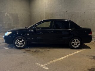 2006 Mitsubishi Lancer IX Рестайлинг, чёрный, 374990 рублей, вид 3