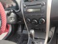 2008 Toyota Corolla AMT X (E140, E150), красный, 695000 рублей - вид 8