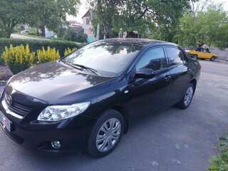 2008 Toyota Corolla X (E140, E150), чёрный, 950000 рублей, вид 1