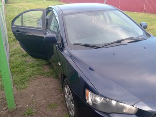 2014 Mitsubishi Lancer X Рестайлинг, синий, 720000 рублей, вид 4