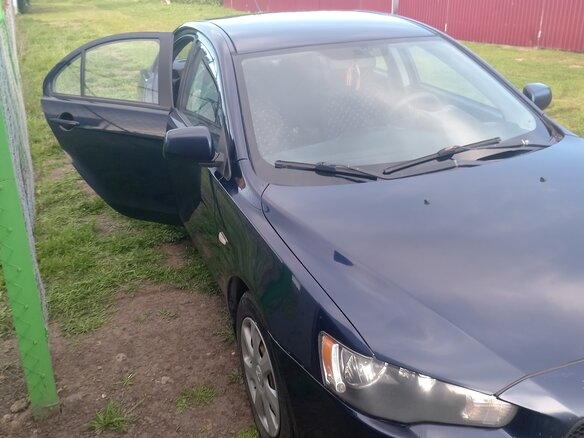 2014 Mitsubishi Lancer X Рестайлинг, синий, 720000 рублей - вид 3