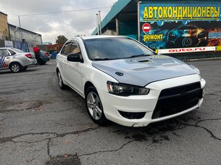 2008 Mitsubishi Lancer X, белый, 750000 рублей, вид 2