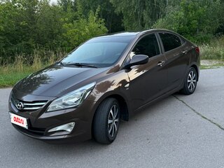 2014 Hyundai Solaris I Рестайлинг, коричневый, 885000 рублей, вид 1