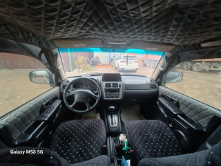 2003 Mitsubishi Pajero iO, чёрный, 550000 рублей, вид 5