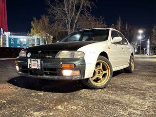 1992 Nissan Bluebird X (U13), белый, 498000 рублей, вид 1