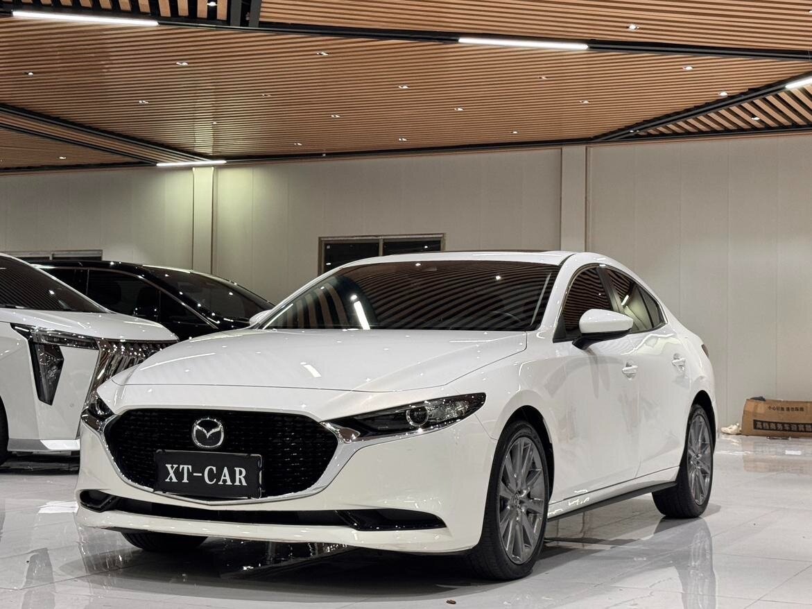 Открыть фотографии: Mazda 3 IV (BP)